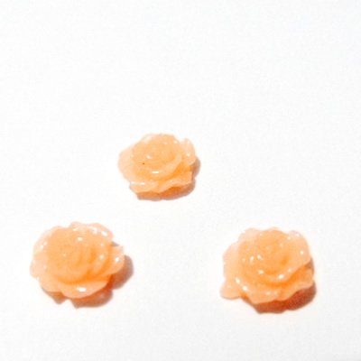 Cabochon rasina, floare portocaliu deschis, 10x6mm